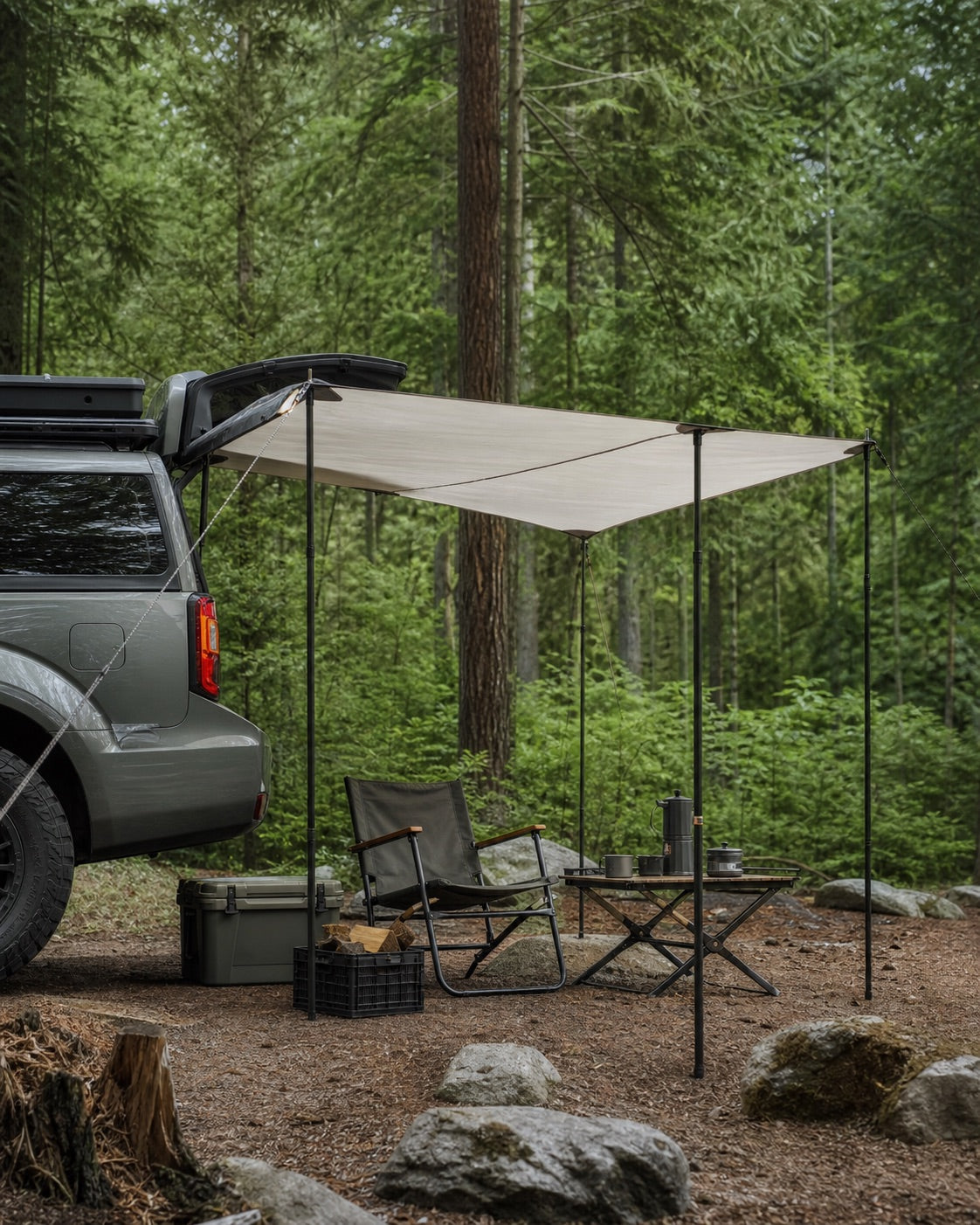 Tailgate awning at a forest campsite