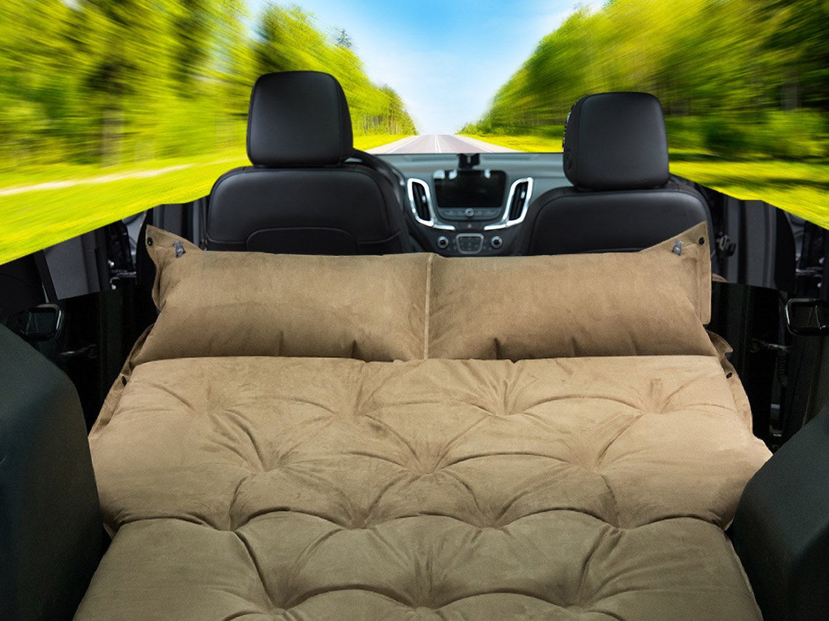 Self-inflating car travel bed in vehicle